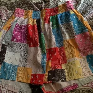 A multi-color baggy pair of shorts. Worn once.